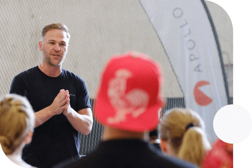 Leader-of-the-company-providing-a-motiviational-speech-to-a-crowd-of-people